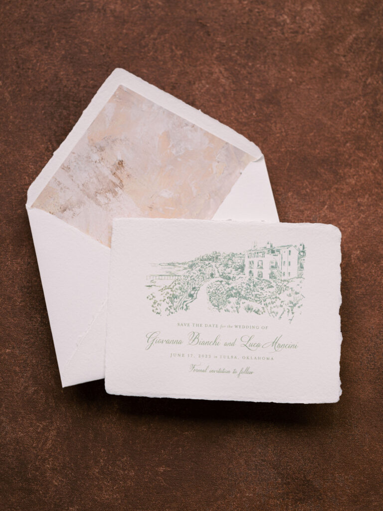 Photograph of wedding invitation with illustration of the Philbrook Museum
