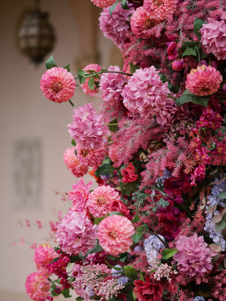 Close-up of textured pink and magenta wedding florals.